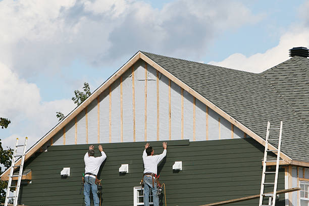 Professional Siding technician working in Evergreen, CO